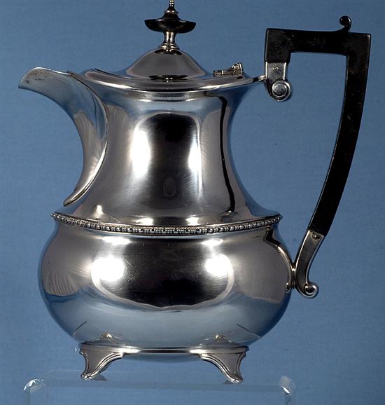 A good George V silver hot water pot, Height to handle 8 ½”/216mm Weight 26.1oz/740grms